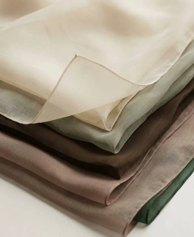 Design Skin Booster — layered sheets of silk folded upon themselves